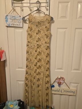 Sleeveless Beige Floral Maxi Dress with Sheer Panel Skirt